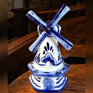 Vintage Delft Blue hand painted porcelain windmill figurine with moving blades.